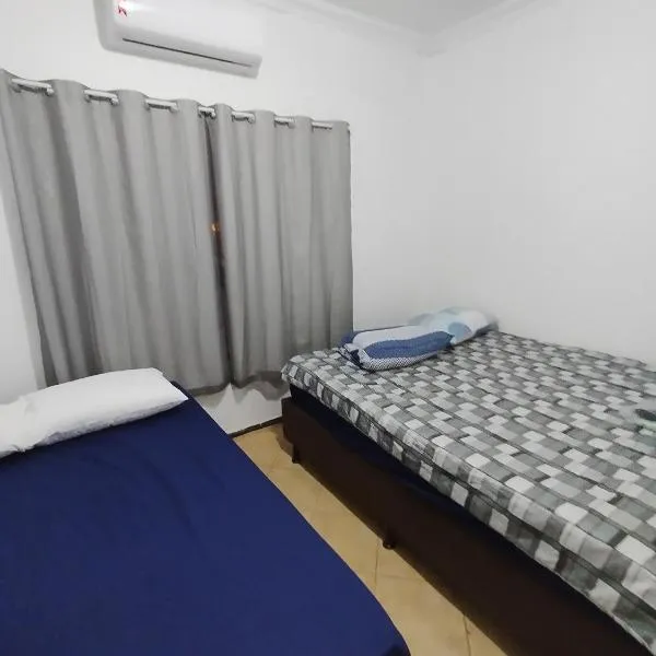 Hotel Indi quarto com banheiro externo