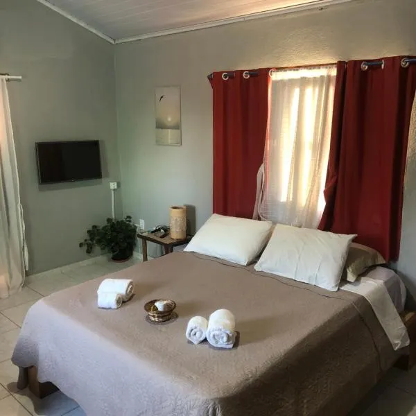 Casa aconchegante em Arraial d'Ajuda - 1 Quarto com 2 camas, Cozinha e Banheiro